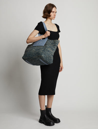 Image of model wearing XL Morris Raffia Tote in DOVE GREY