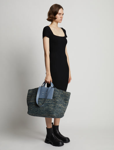 Image of model wearing XL Morris Raffia Tote in DOVE GREY