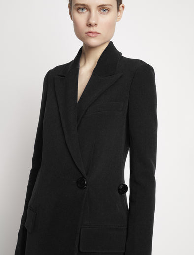 Proenza Schouler detail image of model wearing Bi-Stretch Crepe Wrap Coat in black