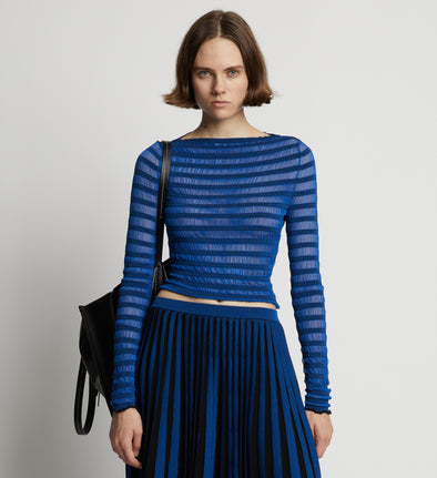 Cropped front image of model wearing Sheer Stripe Sweater in cerulean/black