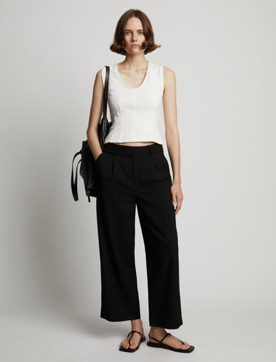 Front image of model wearing Sweatshirt Tank Top in off white