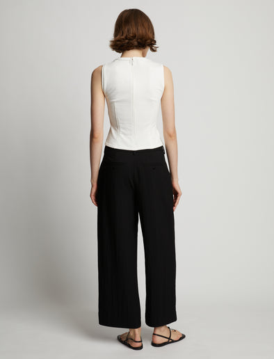 Back image of model wearing Sweatshirt Tank Top in off white