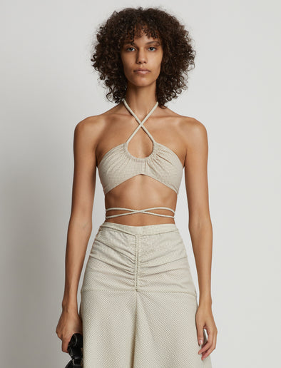 Cropped front image of model wearing Gingham Halter Bralette in buttercream/fawn
