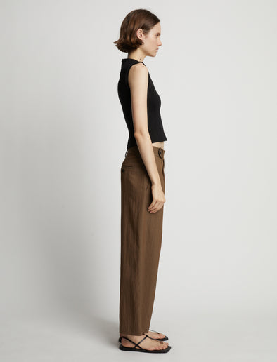 Side image of model wearing Sweatshirt Tank Top in black