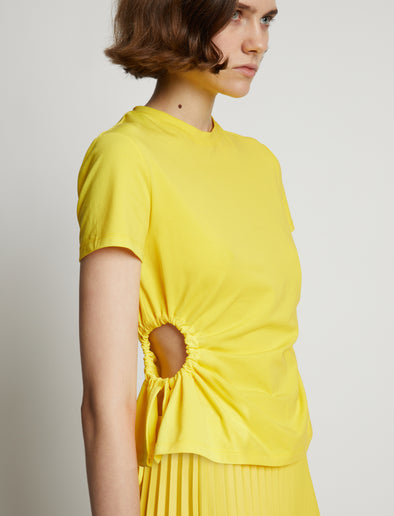 Detail image of model wearing Side Slit T-Shirt in sun