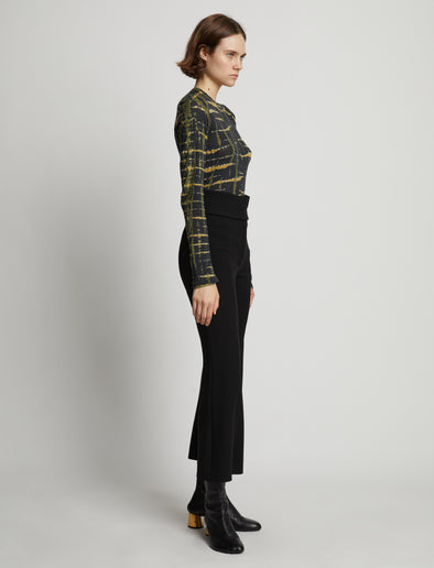 Side image of model wearing Tie Dye Long Sleeve T-Shirt in black multi
