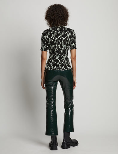 Back image of model wearing Viscose Flou Smocked Top in mint/black