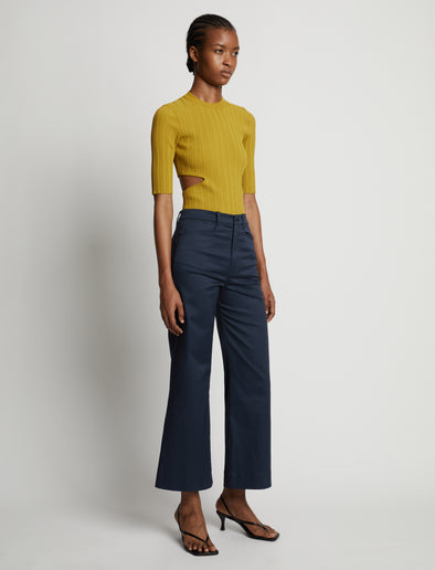 Side image of model wearing Cotton Twill Culottes in navy