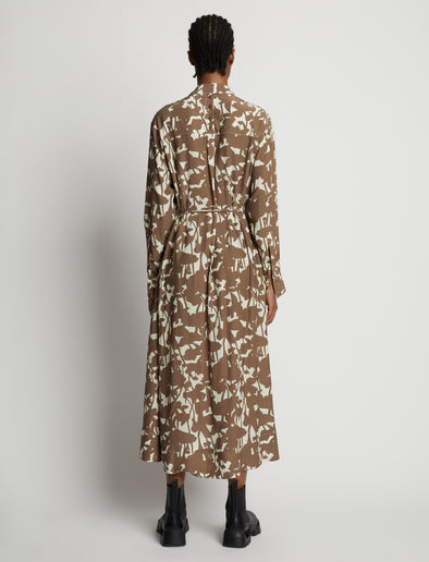 Back image of model wearing Printed Long Sleeve Shirt Dress in buttercream/coffee