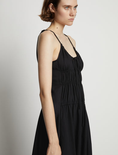 Detail image of model wearing Drapey Suiting Ruched Dress in black