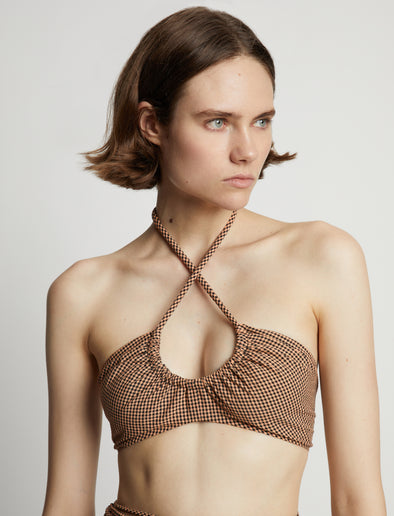 Detail image of model wearing Gingham Halter Bralette in coral/black