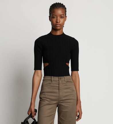 Cropped front image of model wearing Rib Knit Cut Out Sweater in black