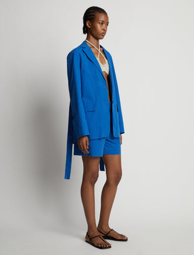 Side image of model wearing Cotton Linen Blazer in cerulean