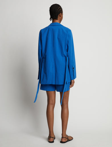 Back image of model wearing Cotton Linen Blazer in cerulean