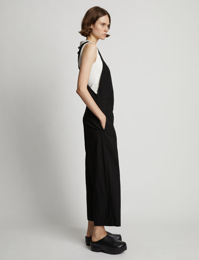 Side image of model wearing Drapey Suiting Wide Leg Jumpsuit in black