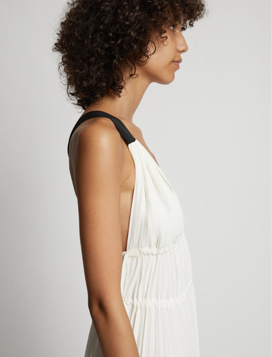 Detail image of model wearing Broomstick Pleated Tank Dress in off white