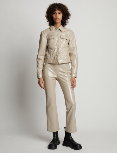 Front image of model wearing Vinyl Cropped Jacket in fawn