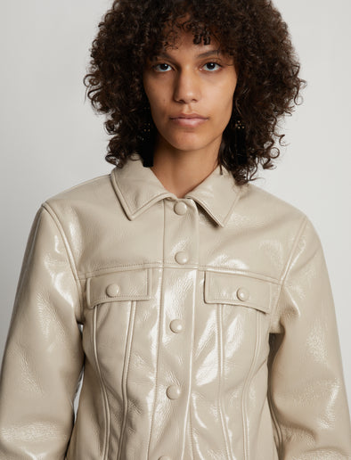 Detail image of model wearing Vinyl Cropped Jacket in fawn