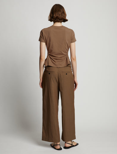 Back image of model wearing Side Slit T-Shirt in coffee