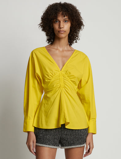 Cropped front image of model wearing Poplin V-Neck Top in sun