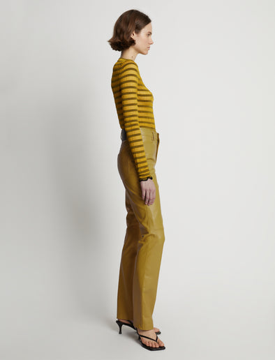Side image of model wearing Leather Straight Pant in sulphur