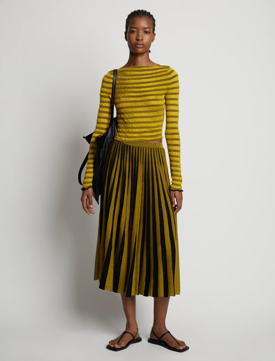 Front image of model wearing Sheer Stripe Sweater in sulphur/black