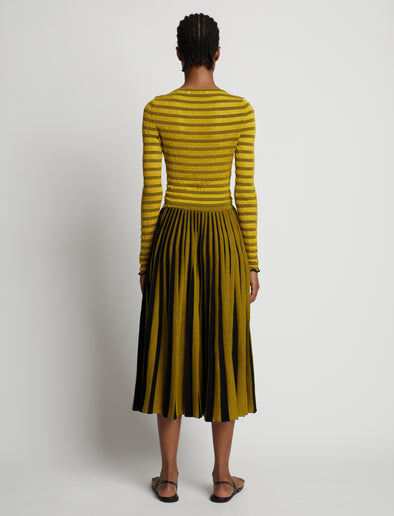 Back image of model wearing Sheer Stripe Sweater in sulphur/black