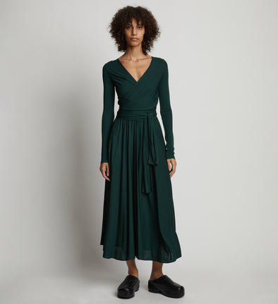 Front image of model wearing Matte Crepe Wrap Dress in pine