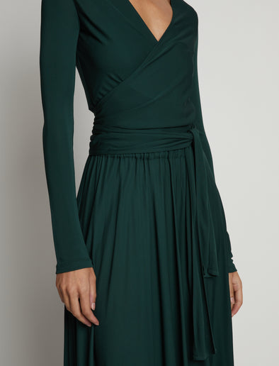 Detail image of model wearing Matte Crepe Wrap Dress in pine