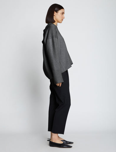 Side image of model wearing Eco Cashmere Oversized Sweater in grey melange