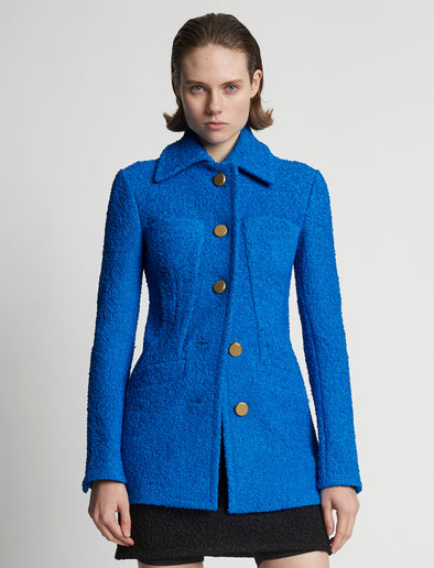 Cropped front image of model wearing Boucle Tweed Jacket in turquoise