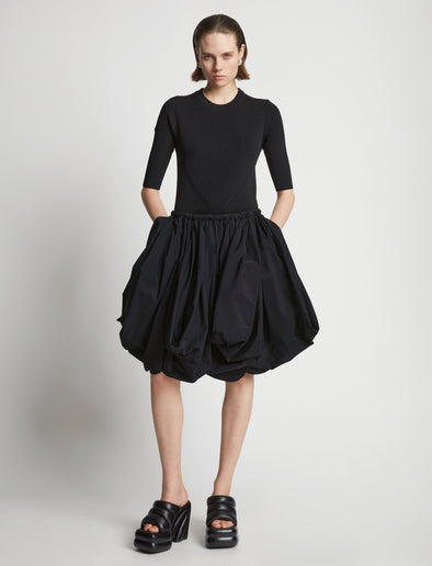 Front image of model wearing Technical Nylon Skirt in black