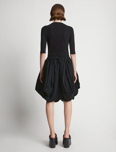 Back image of model wearing Technical Nylon Skirt in black