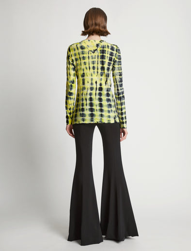 Back image of model wearing Tie Dye T-Shirt in yellow multi