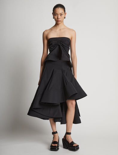 Front image of model wearing Technical Nylon Strapless Top in black