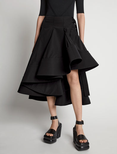 Detail image of model wearing Technical Nylon Wrap Skirt in black
