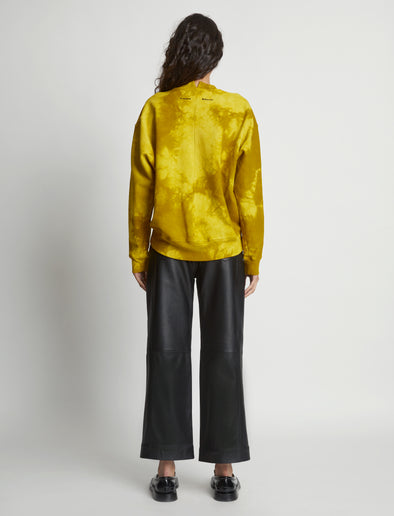 Back image of model wearing Tie Dye Sweatshirt in sulphur/muted lime