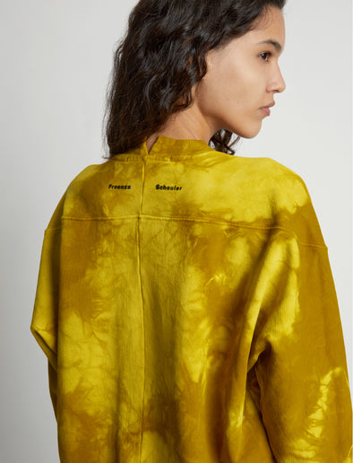 Detail image of model wearing Tie Dye Sweatshirt in sulphur/muted lime