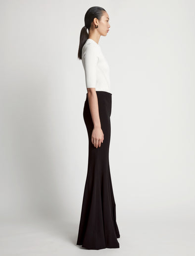 Side image of model wearing Viscose Suiting Pants in black