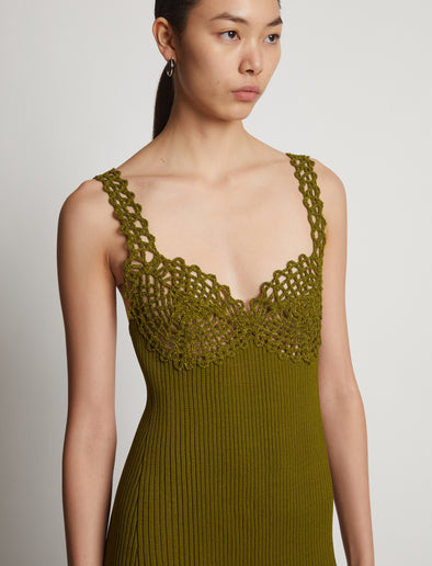 Detail image of model wearing Embroidered Viscose Knit Dress in olive