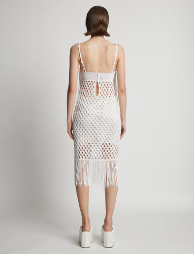 Back image of model wearing Lacquered Knit Dress in white