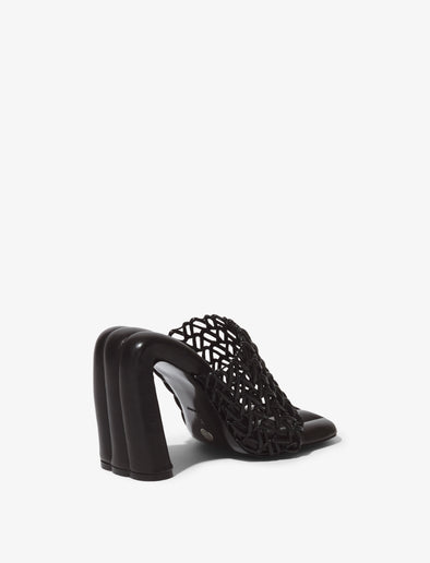 Back 3/4 image of Arc Woven Slides in black
