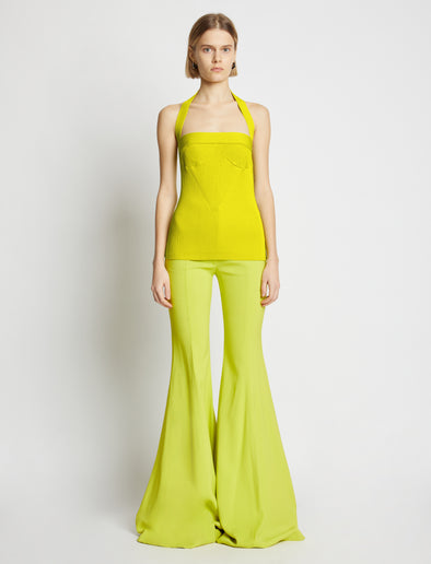 Front image of model wearing Viscose Knit Halter Top in sulphur