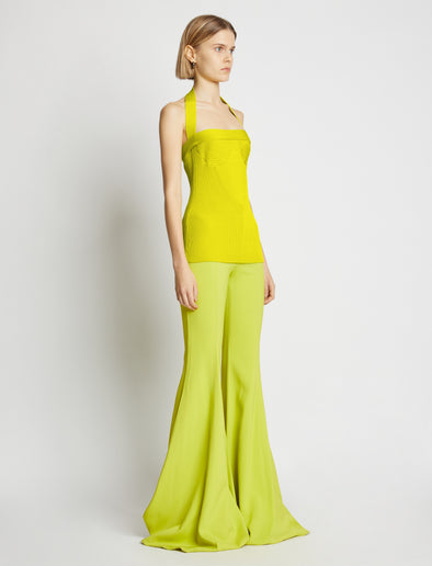 Side image of model wearing Viscose Knit Halter Top in sulphur