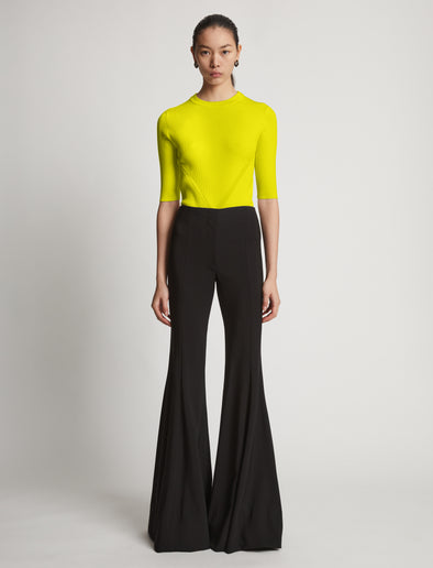 Front image of model wearing Viscose Knit Top in sulphur