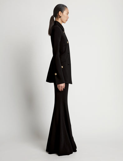 Side image of model wearing Viscose Suiting Jacket in black