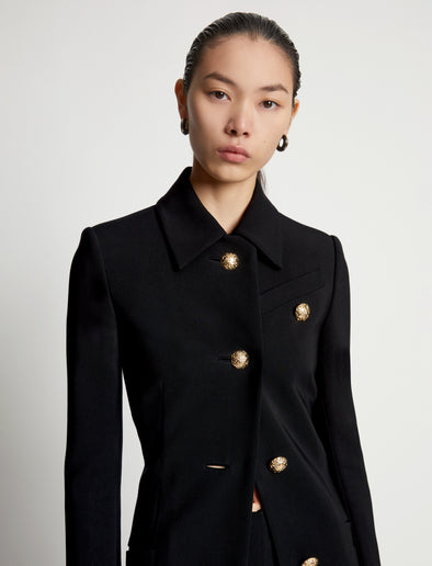 Detail image of model wearing Viscose Suiting Jacket in black