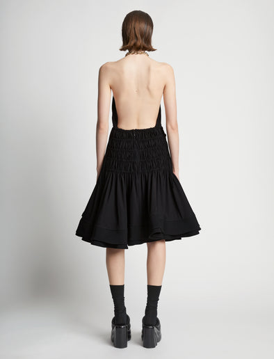 Back image of model wearing Stretch Nylon Dress in black
