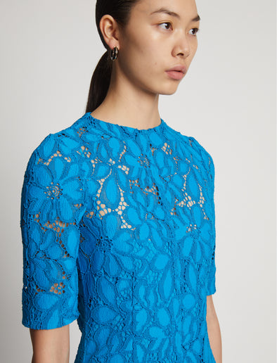 Detail image of model wearing Lace Dress in turquoise
