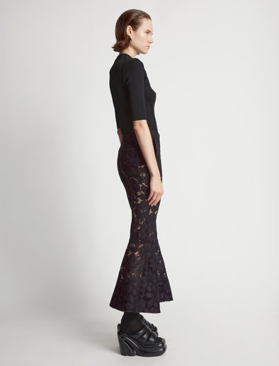 Side image of model wearing Lace Pants in black